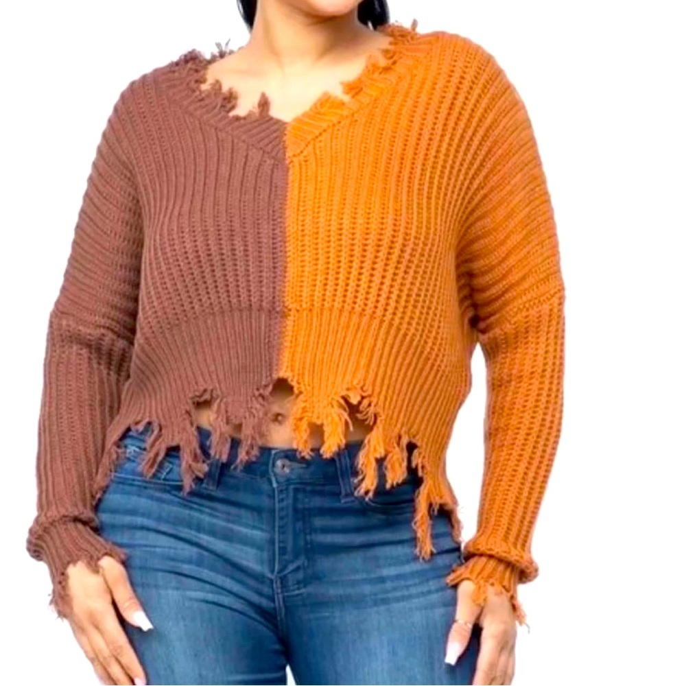 Two toned sweater. Available in sizes S, M and L.